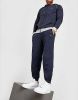 Hugo Boss Mix&Match tapered fit loungebroek met steekzakken en logo online kopen